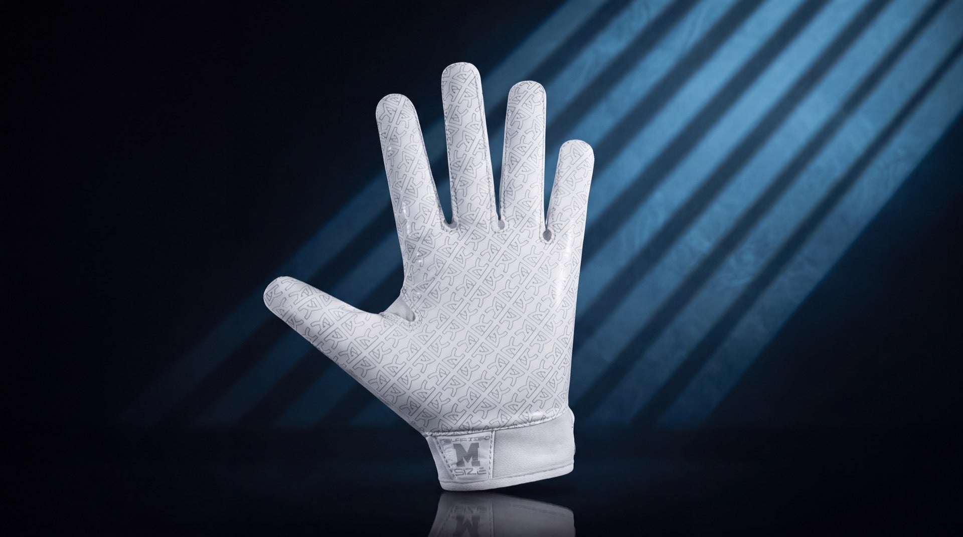 White Reyrr ZERO receiver glove with grip pattern facing camera in cold blue striped studio light, cover for the receiver glove buying guide